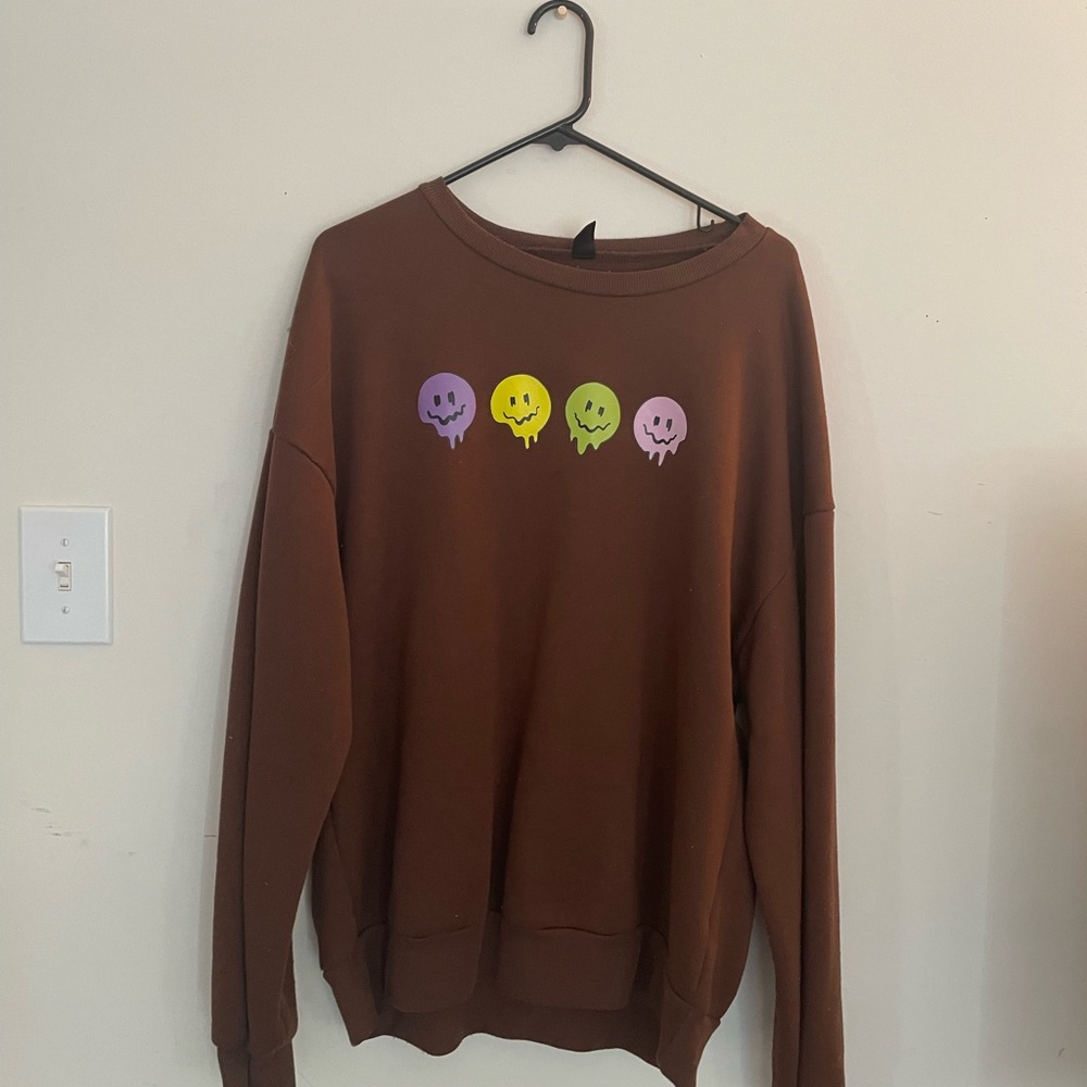 Brown oversized crewneck with smileys from SHEIN size M